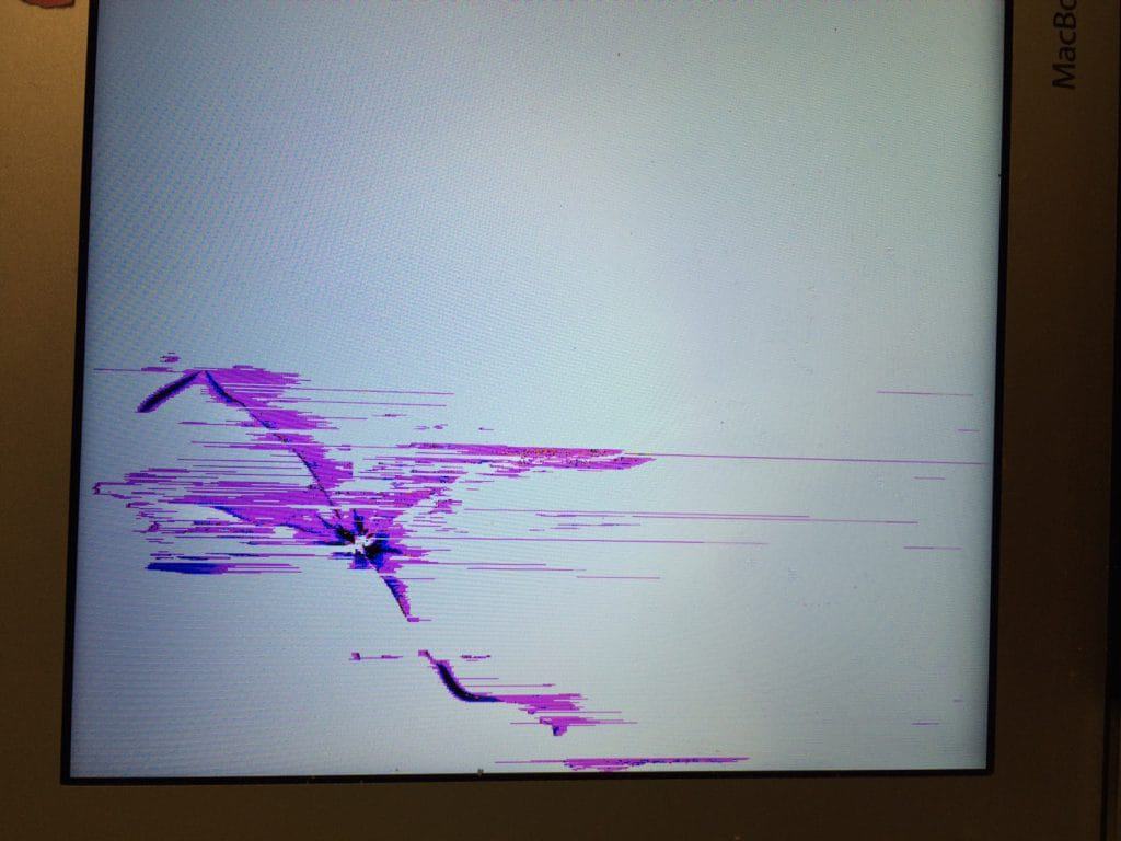 Picture of MacBook Air with display cracked
