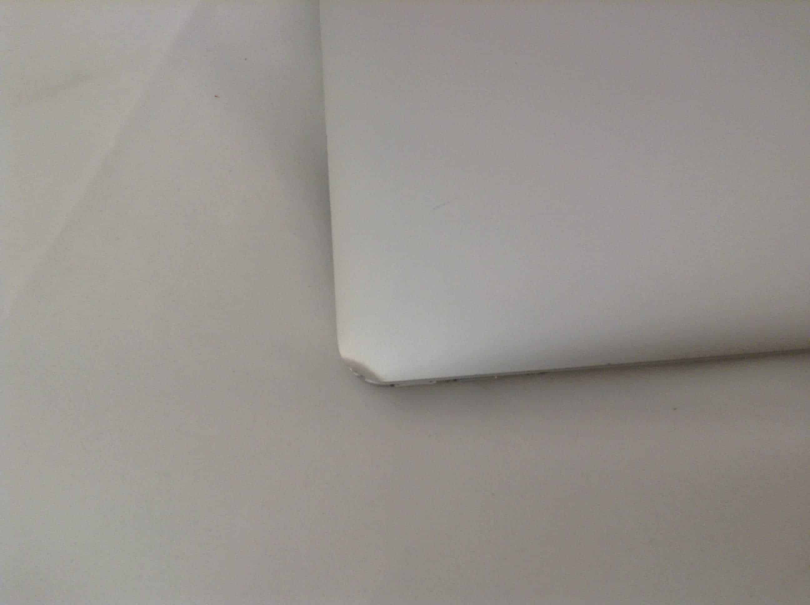 MacBook Air with dent on Corner