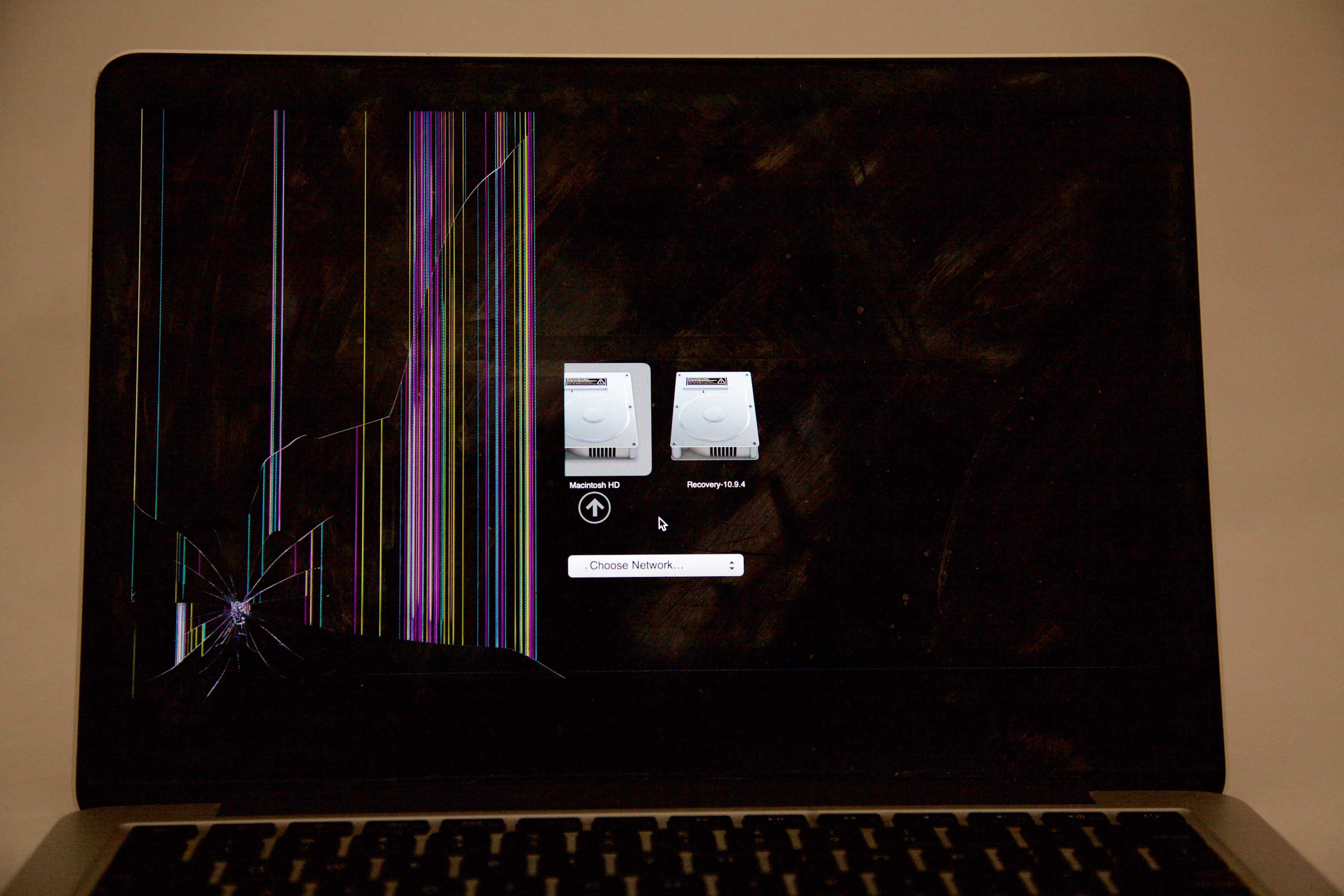 13" Retina MacBook Pro with hit to the display resulting in cracked glass as well as cracked LCD