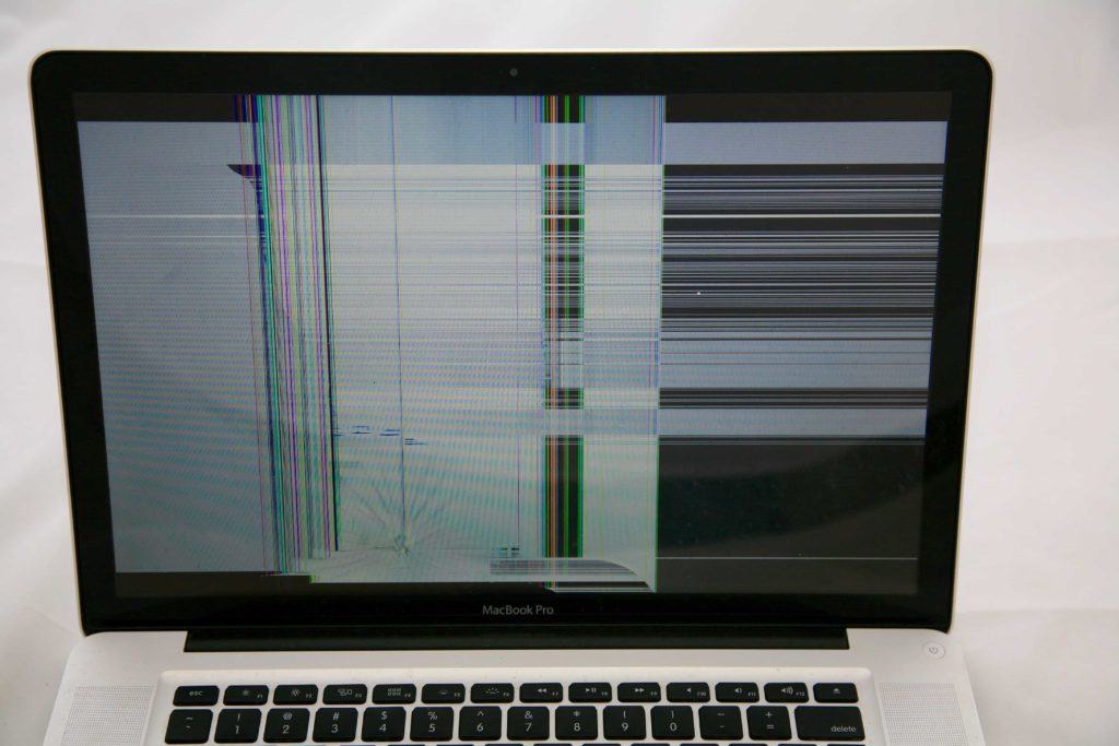 Non Retina MacBook pro with hit from the back causing the LCD to crack but the glass is still intact