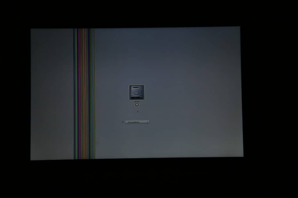 MacBook with bar of lines on the display