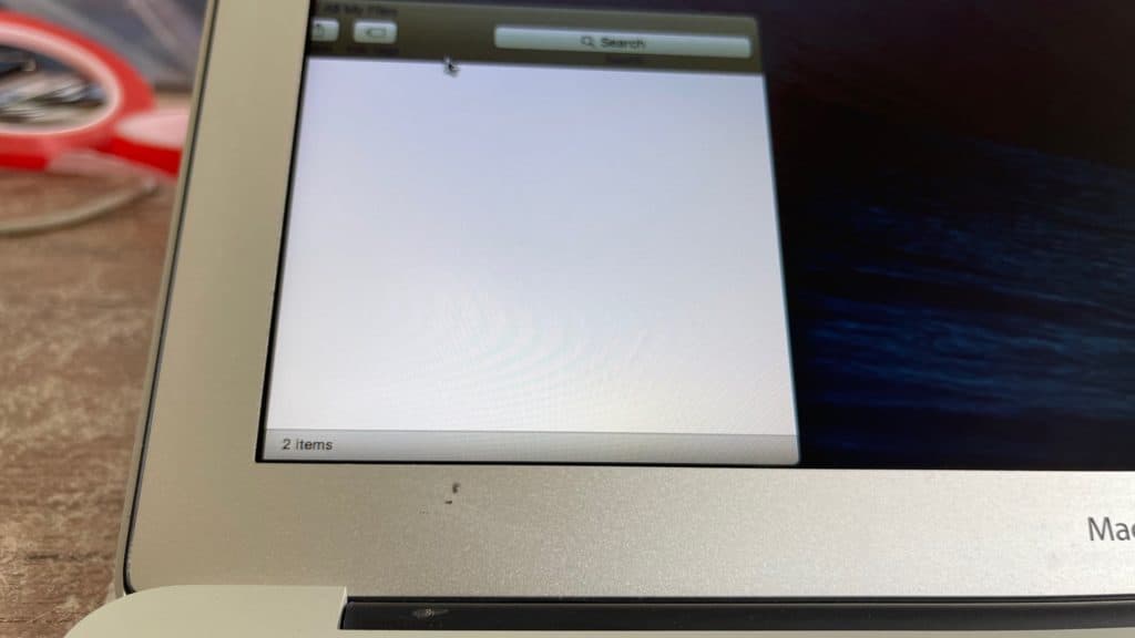 MacBook Air With Crack On Bottom Left Of Screen 4