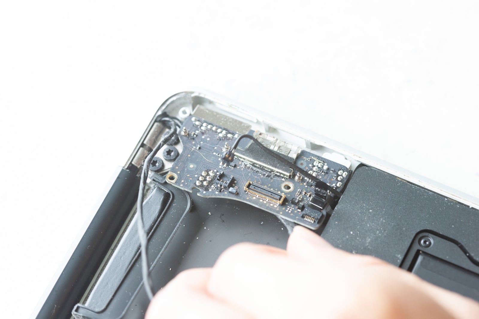 Removing IO board from MacBook Air A1466