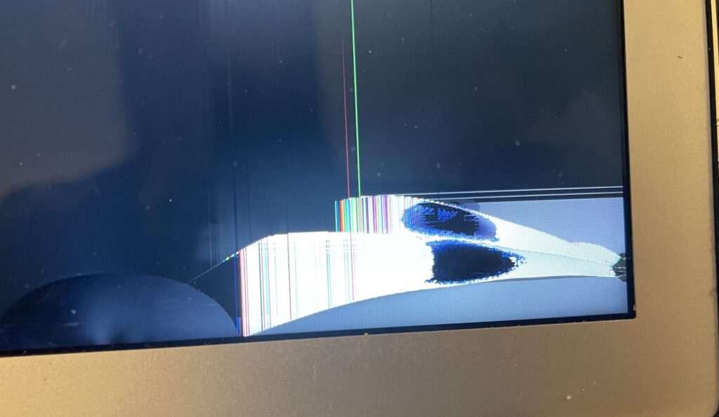 closeup of MacBook Air cracked screen