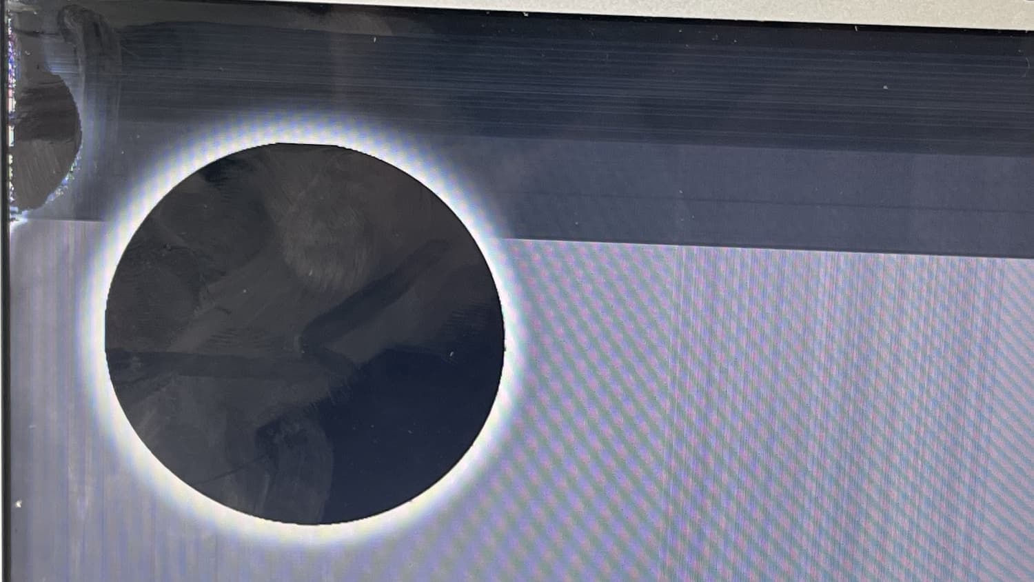 2015 MacBook Air With Black Circle On Screen 2 Closeup of 2015 MacBook Air With Black Circle On Screen