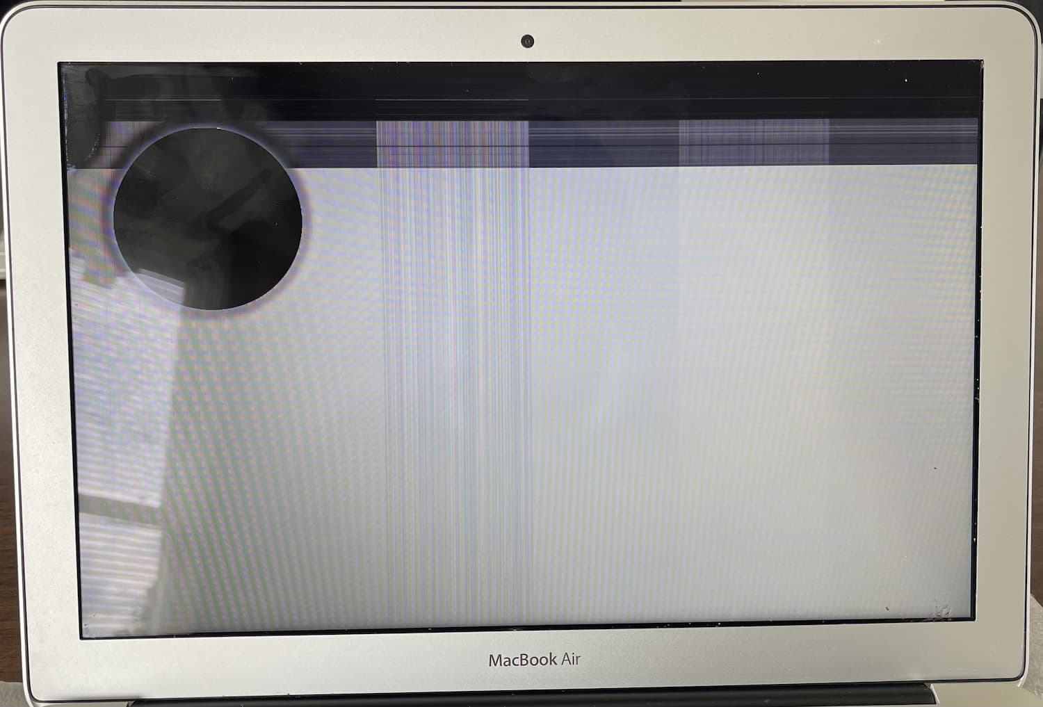 2015 MacBook Air With Black Circle On Screen