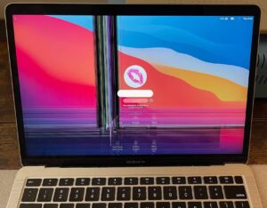 MacBook Air Screen Repair 11 A2337 cracked at center bottom left with vertical bar